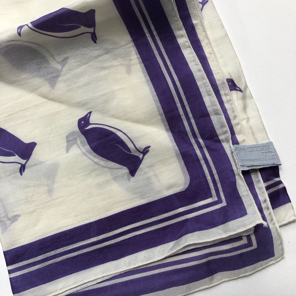 Silk scarf with purple penguins.